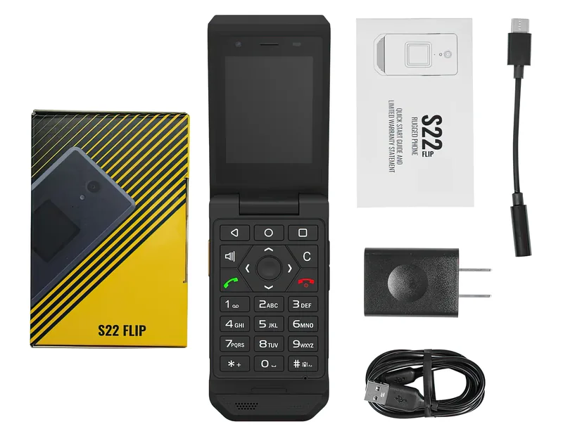 Open next to its retail box, charger and cable