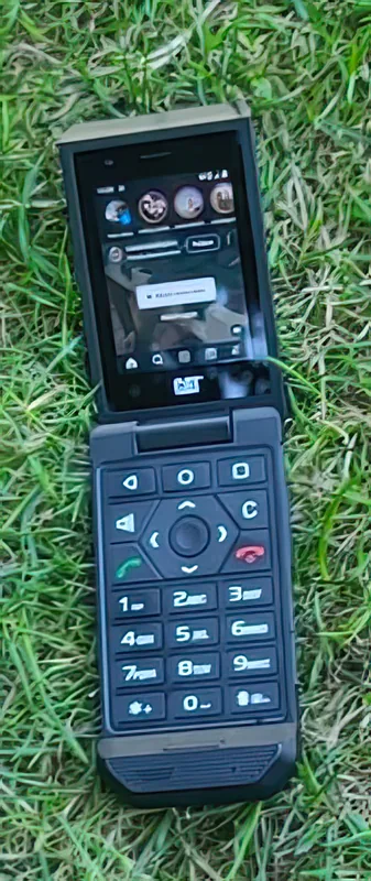 Open and lying in grass