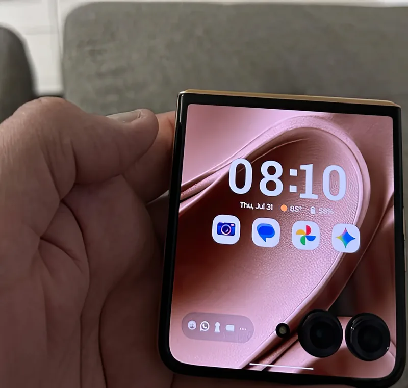 The Hot Pink version held closed, with shortcuts on the cover display