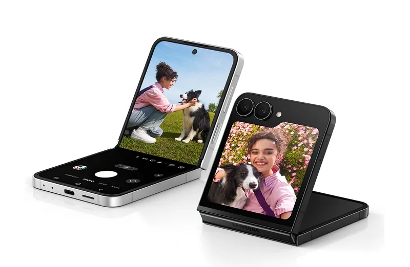 Two units, one folded halfway with the camera app split across the bend and one closed, shooting a selfie on the cover screen