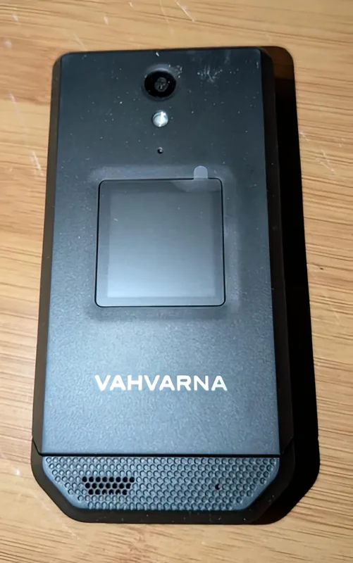 The back of the phone, with the factory film still on the cover display