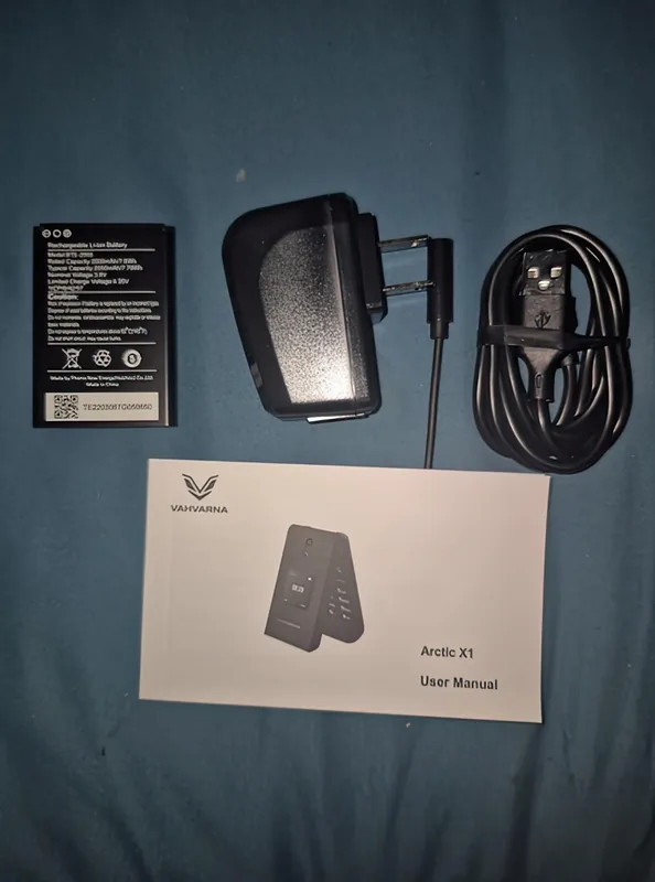 In the box: spare battery, charging brick, USB cable and the Arctic X1 user manual